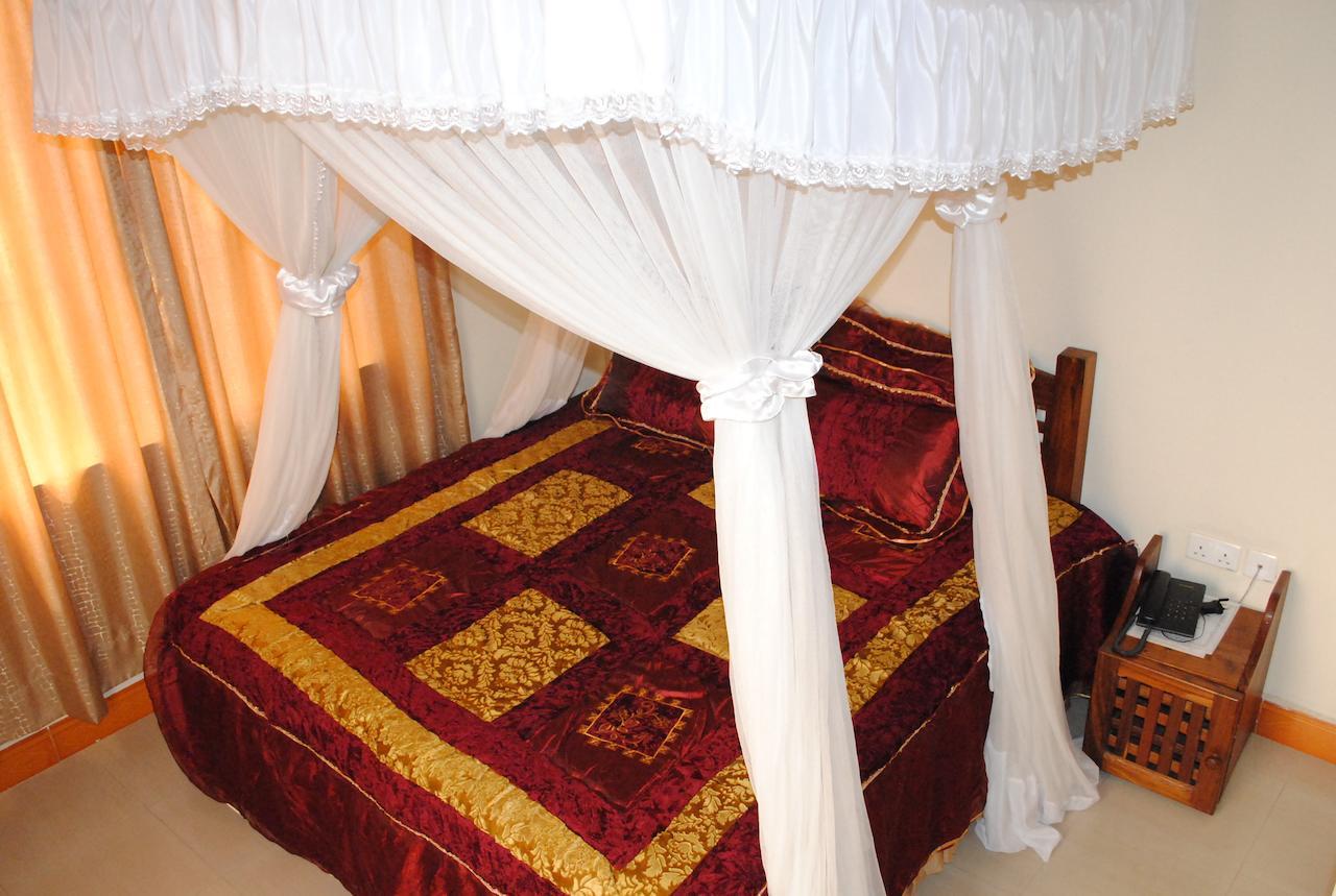 Briston Hotel أروشا الغرفة الصورة